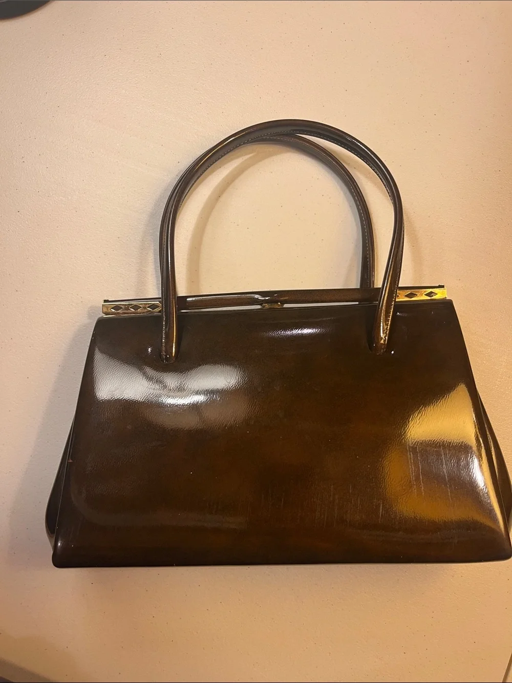 Structured Patent Leather Satchel in Dark Brown with Gold Accents